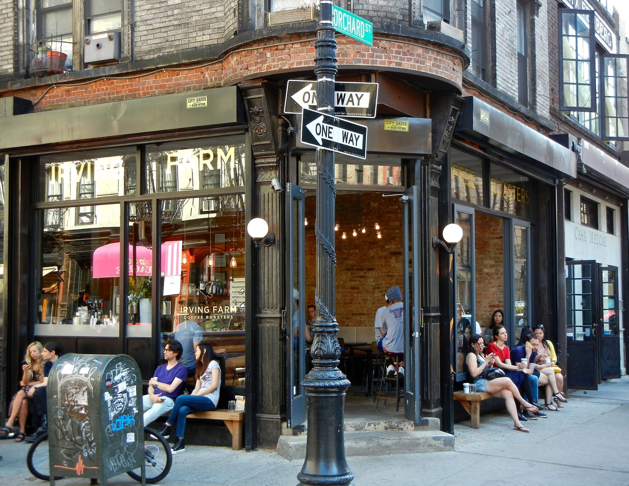 Image of the front of Irving House coffee shop on Orchard Street with people sitting outside