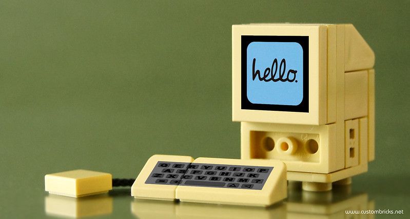 A LEGO rendition of the first Apple computer with the phrase “Hello” on the screen